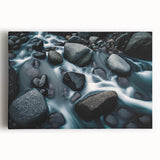 Stretched canvas wall art showcasing a serene landscape with vibrant rock formations and a colorful sky, perfect for enhancing home decor. Bright hues of orange and blue create a calming atmosphere, ideal for nature lovers.