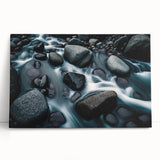 Stretched canvas wall art showcasing an abstract landscape design with vibrant colors, leaning against a neutral wall, perfect for modern home decor.
