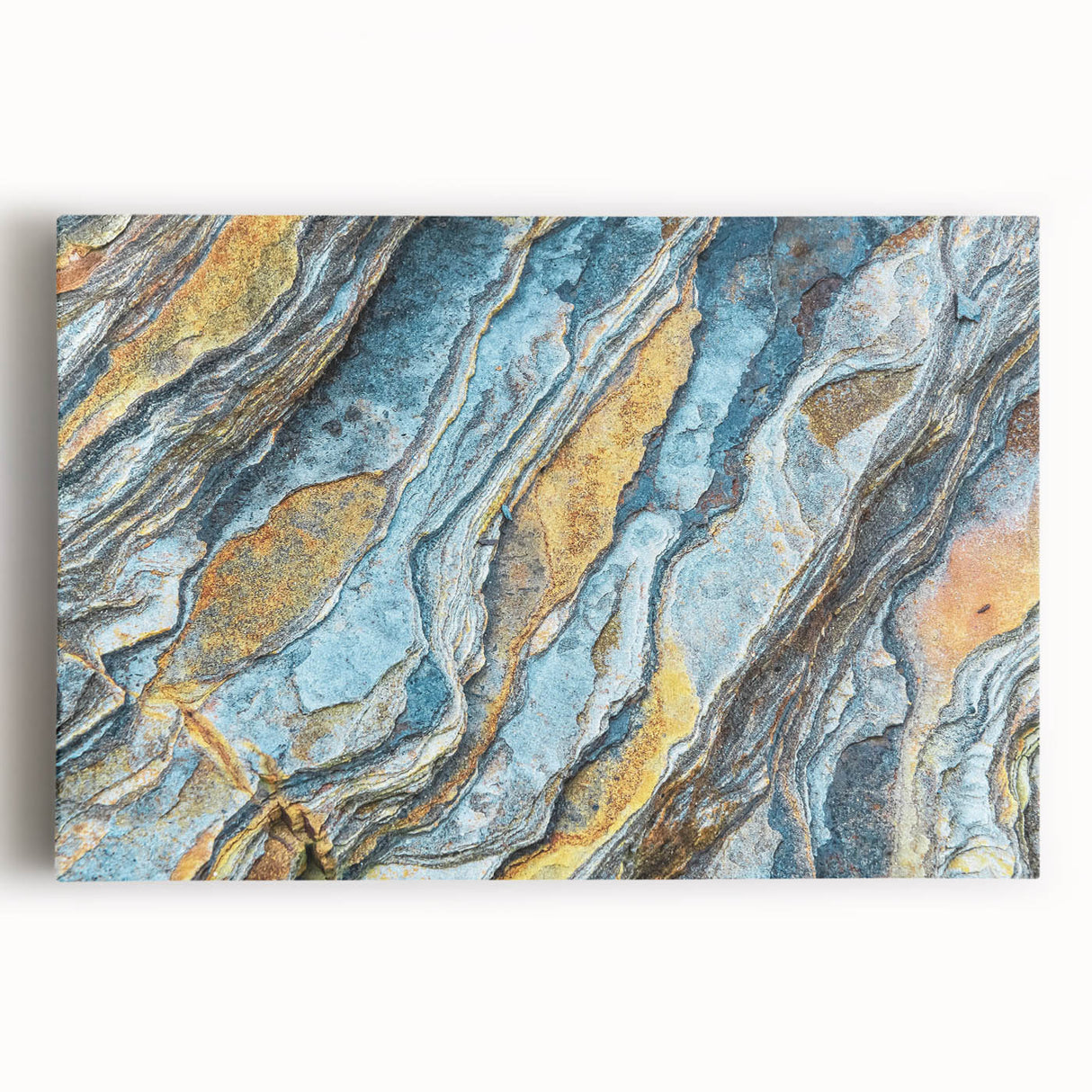 Stretched canvas wall art showcasing a vibrant landscape design with colorful rocks and natural elements, ideal for home decor and artistic enhancement.