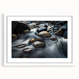 Framed wall art featuring a serene landscape with rocks and soft colors, displayed in a white mat and frame, adding a calming touch to any decor.