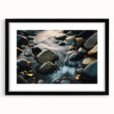 Framed wall art featuring a striking landscape design with rocky formations, set in a sleek black frame with a white mat, perfect for modern home decor.