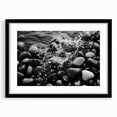 Framed landscape wall art featuring a serene rocky terrain design with a black mat, perfect for adding a modern touch to home decor.
