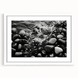 Framed white mat wall art showcasing a serene landscape with rocks, perfect for home decor. Ideal for adding a natural touch to living spaces.