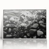 Framed acrylic wall art showcasing a stunning landscape design with textured rocks, presented in a sleek white frame, ideal for modern decor.