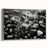 Framed canvas wall art showcasing a modern landscape design with rocks, featuring a sleek silver frame, ideal for contemporary home decor.