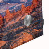 Close-up view of a vibrant acrylic glass wall art piece showcasing a rocky landscape design, featuring rich textures and earthy hues, perfect for modern decor.