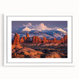 Framed landscape wall art featuring a serene rocky scene with subtle earth tones and a white mat, ideal for home decor and interior design enhancement.