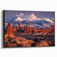 Framed canvas wall art showcasing a stunning landscape design with rocky formations, set against a sleek black frame, perfect for enhancing modern home decor.