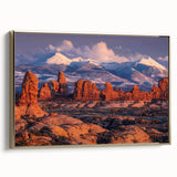 Framed canvas wall art showcasing a serene landscape with rocks, featuring a gold frame that adds elegance, ideal for modern home decor.