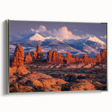 Framed wall art showcasing a serene landscape with rocks, set in a silver frame, ideal for modern home decor. Perfect for adding a touch of elegance to any room.