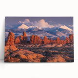 Stretched canvas wall art showcasing a serene landscape design with rocks and vibrant colors, elegantly leaning against a textured backdrop, perfect for modern decor.