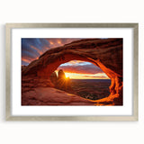 Framed silver wall art featuring a scenic landscape of rugged rocks, showcasing earthy tones and intricate details, perfect for modern home decor.