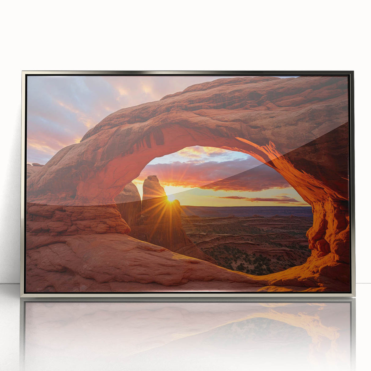 Framed acrylic wall art showcasing a serene landscape with rocky formations, featuring silver accents and a modern design, perfect for home decor.