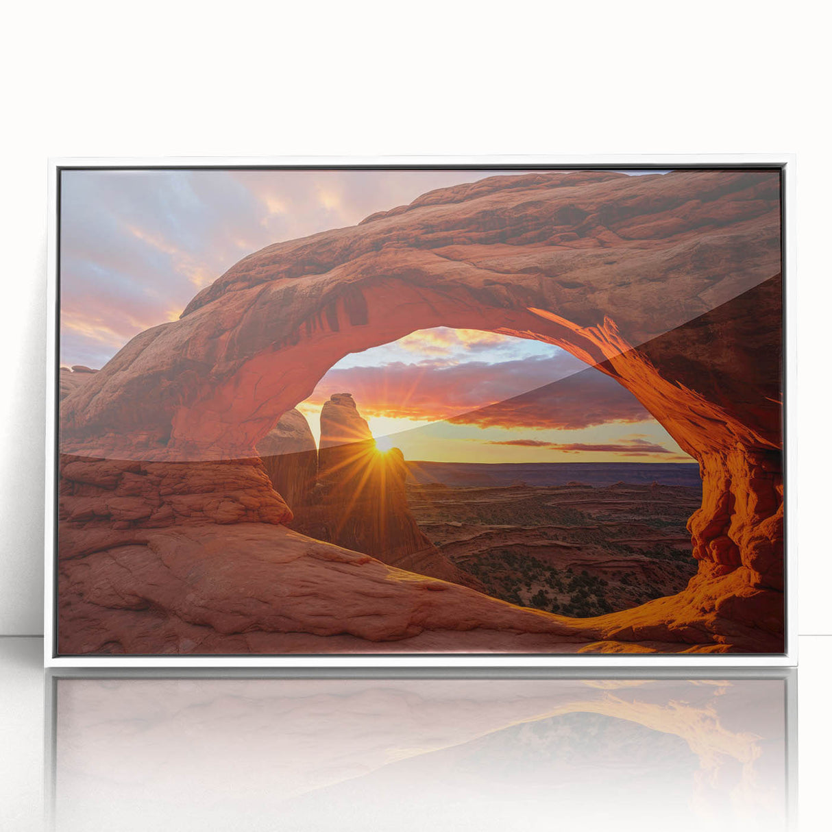 Framed acrylic wall art featuring a stunning landscape design with vibrant rocks and earthy tones, showcased in a sleek white frame, ideal for modern decor.