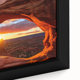 Close-up of a framed canvas featuring a vibrant landscape design with rocky formations and earthy tones, ideal for home decor and art enthusiasts.