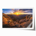 Stunning rolled print of a serene landscape featuring intricate rock formations and vibrant colors, perfect for home decor or art enthusiasts, elegantly packaged for safe delivery.