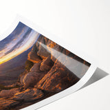 Vibrant rolled canvas print showcasing a striking abstract landscape with bold rock formations and rich colors, ideal for enhancing modern home decor.