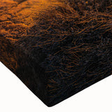 Close-up of a vibrant stretched canvas wall art piece showcasing a stunning landscape with textured rocks and natural colors, perfect for home decor enhancement.