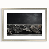 Framed wall art featuring a serene landscape design with rocky formations, accented by a silver frame and mat, ideal for enhancing home decor aesthetics.