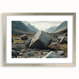 Framed wall art featuring a serene landscape design with rocks and natural elements, elegantly presented in a silver frame with a mat, perfect for home decor.