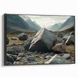 Framed canvas wall art showcasing a stunning landscape with rocks, featuring rich colors and intricate textures, perfect for enhancing home decor. The piece is presented in a sleek black frame, adding a modern touch to any room.