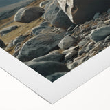 Colorful rolled canvas wall art showcasing a vibrant landscape with striking rock formations, ideal for home decor. Packaged securely in a cardboard tube for delivery.