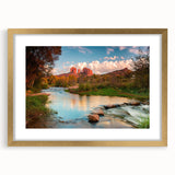 Framed wall art featuring a stunning landscape with rocky formations, accented by a gold mat, ideal for modern home decor. Perfect for adding elegance to any room.