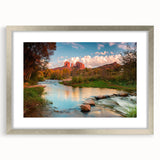 Framed wall art featuring a serene landscape design with textured rocks and earthy tones, elegantly showcased in a silver frame with a mat, perfect for home decor.