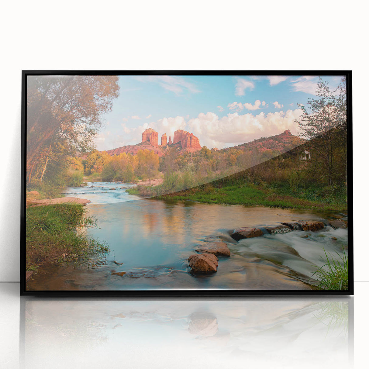 Framed acrylic wall art showcasing a striking landscape with textured rocks, presented in a sleek black frame, ideal for modern home decor.