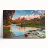 Stretched canvas wall art showcasing a serene landscape with rocks and vibrant greenery, perfect for home decor. The design evokes tranquility and nature's beauty.