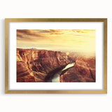 Framed wall art design showcasing a serene landscape with rocks, featuring a gold mat and frame, perfect for enhancing home decor aesthetics.