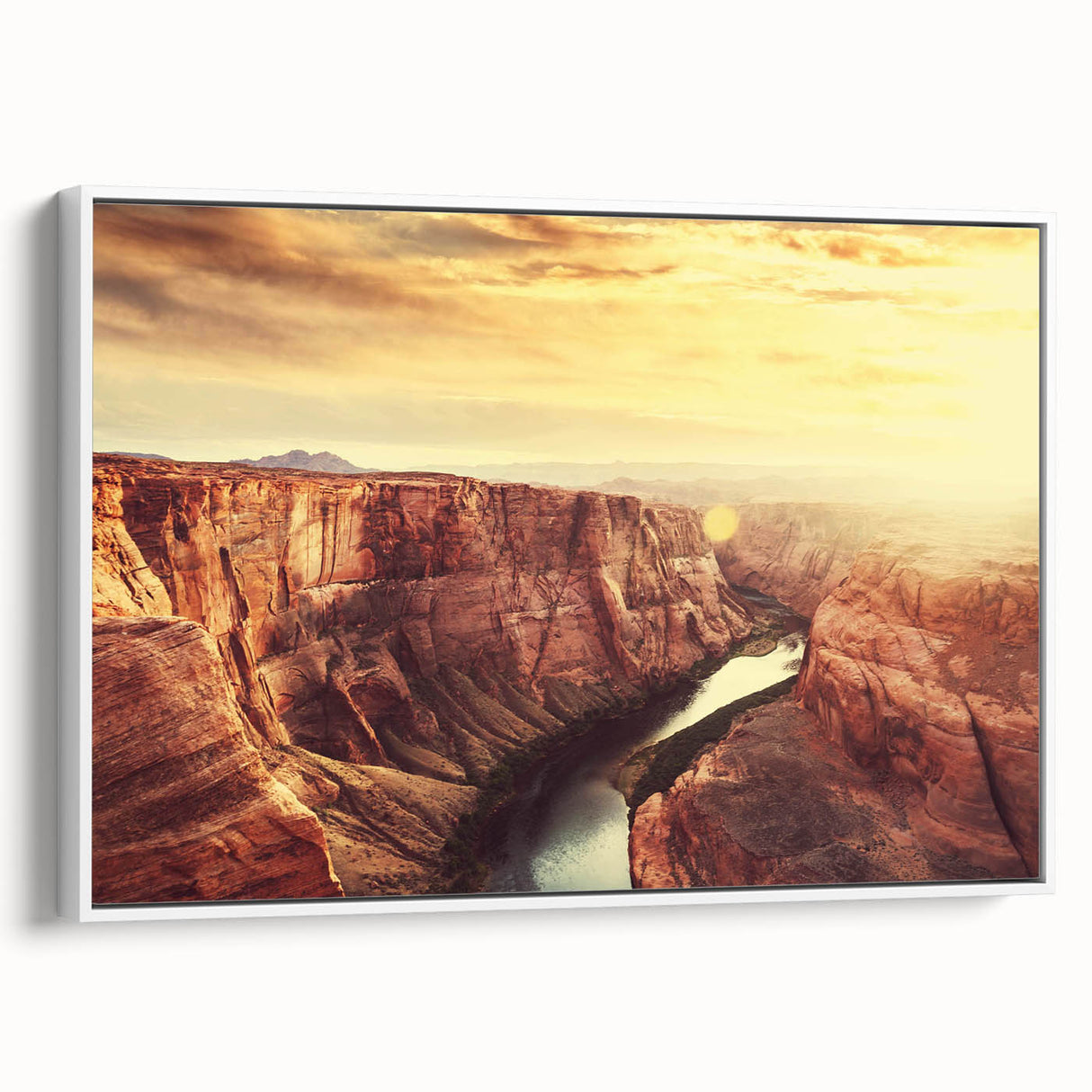 Framed canvas wall art showcasing a serene landscape with prominent rocks and natural colors, displayed against a white background, ideal for home decor.