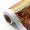 Rolled canvas featuring a vibrant landscape design with textured rocks and earthy tones, perfect for home décor. Packaged securely in a durable cardboard tube for safe shipping.