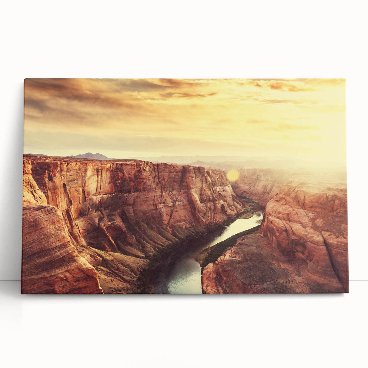 Stretched canvas wall art featuring a stunning landscape of rocky mountains under a vibrant sunset, perfect for enhancing home decor with natural beauty.