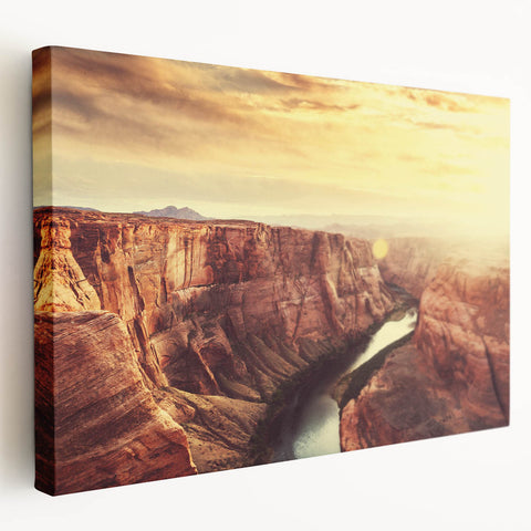 Stretched canvas artwork featuring a stunning landscape design with rocky formations and vibrant colors, ideal for home or office wall decor.