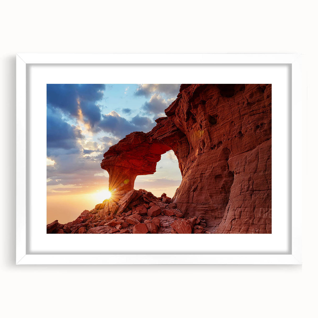 Framed wall art featuring a serene landscape with textured rocks and earthy tones, set in a white mat and frame, perfect for enhancing home décor.