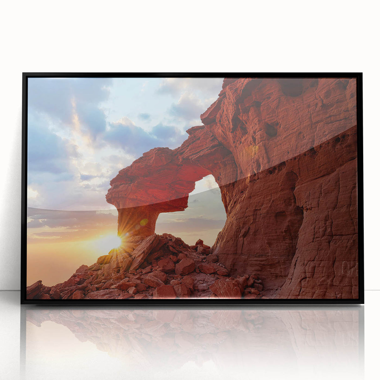Framed acrylic wall art featuring a striking landscape design with bold rocks and natural elements, presented in a sleek black frame, perfect for modern decor.