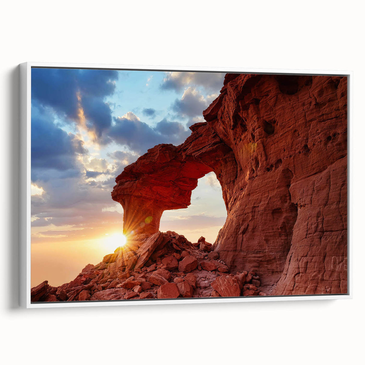 Framed canvas wall art showcasing a serene landscape design with rugged rocks and soft hues, elegantly presented with a white frame for modern decor.