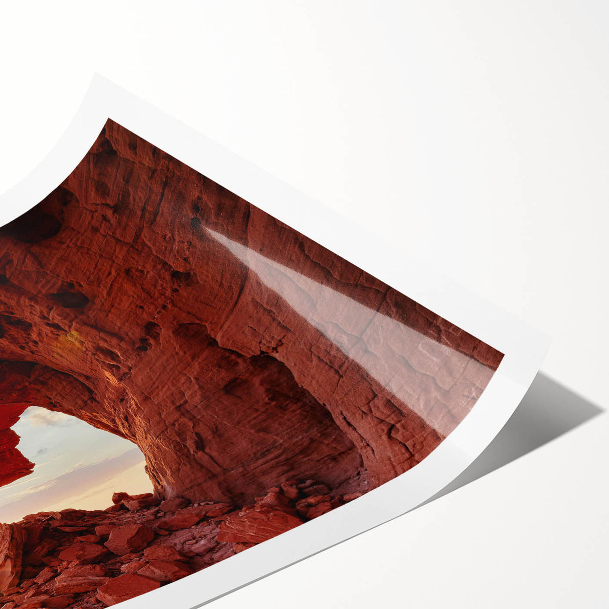 Rolled print showcasing a serene landscape design with textured rocks and earthy tones, perfect for home decor, packaged securely in a cardboard tube.
