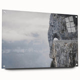 Acrylic glass wall art showcasing a modern landscape design featuring rocks and natural elements, displayed from a side view with minimalist pins for mounting.