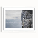 Framed wall art featuring a serene landscape design with textured rocks and soft colors, set in a white mat and sleek frame, perfect for home decor.