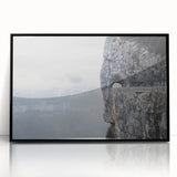 Framed acrylic wall art featuring a stunning landscape design with intricate rock formations, presented in a sleek black frame, ideal for modern home decor.