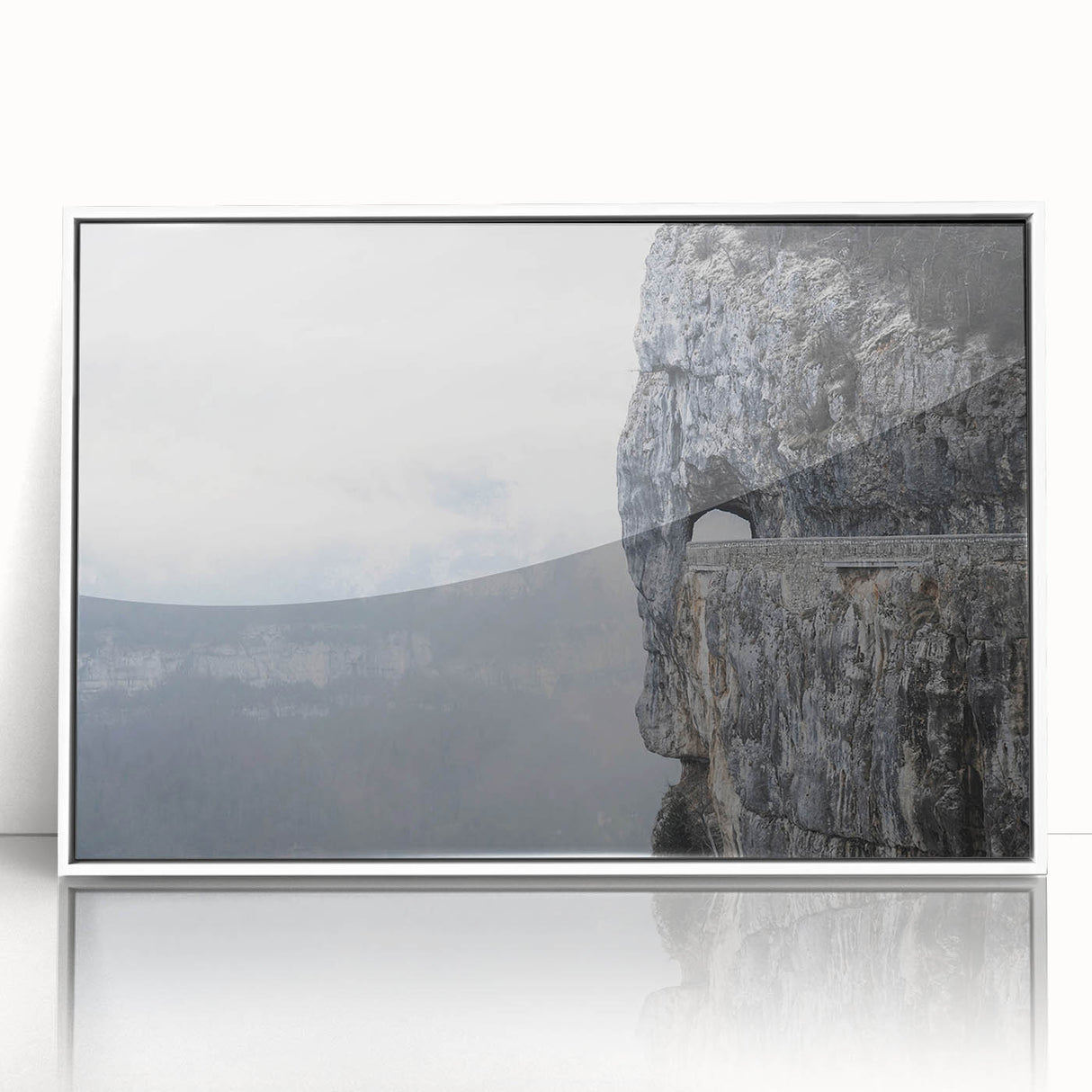 Framed wall art collection featuring a serene landscape of rocks, displayed in a sleek white frame, perfect for modern home decor, enhancing any living space with nature's beauty.