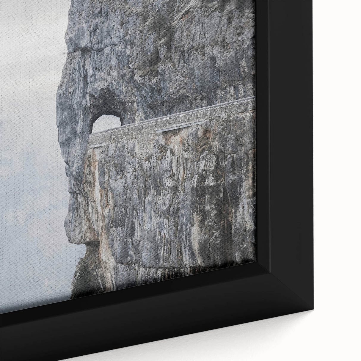 Close-up of a framed canvas wall art piece showcasing an intricate landscape design with rocky textures, ideal for modern home décor and artistic interiors.