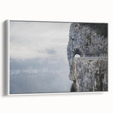 Framed canvas wall art featuring a serene landscape with textured rocks and earthy tones, elegantly displayed against a white backdrop, perfect for modern decor.
