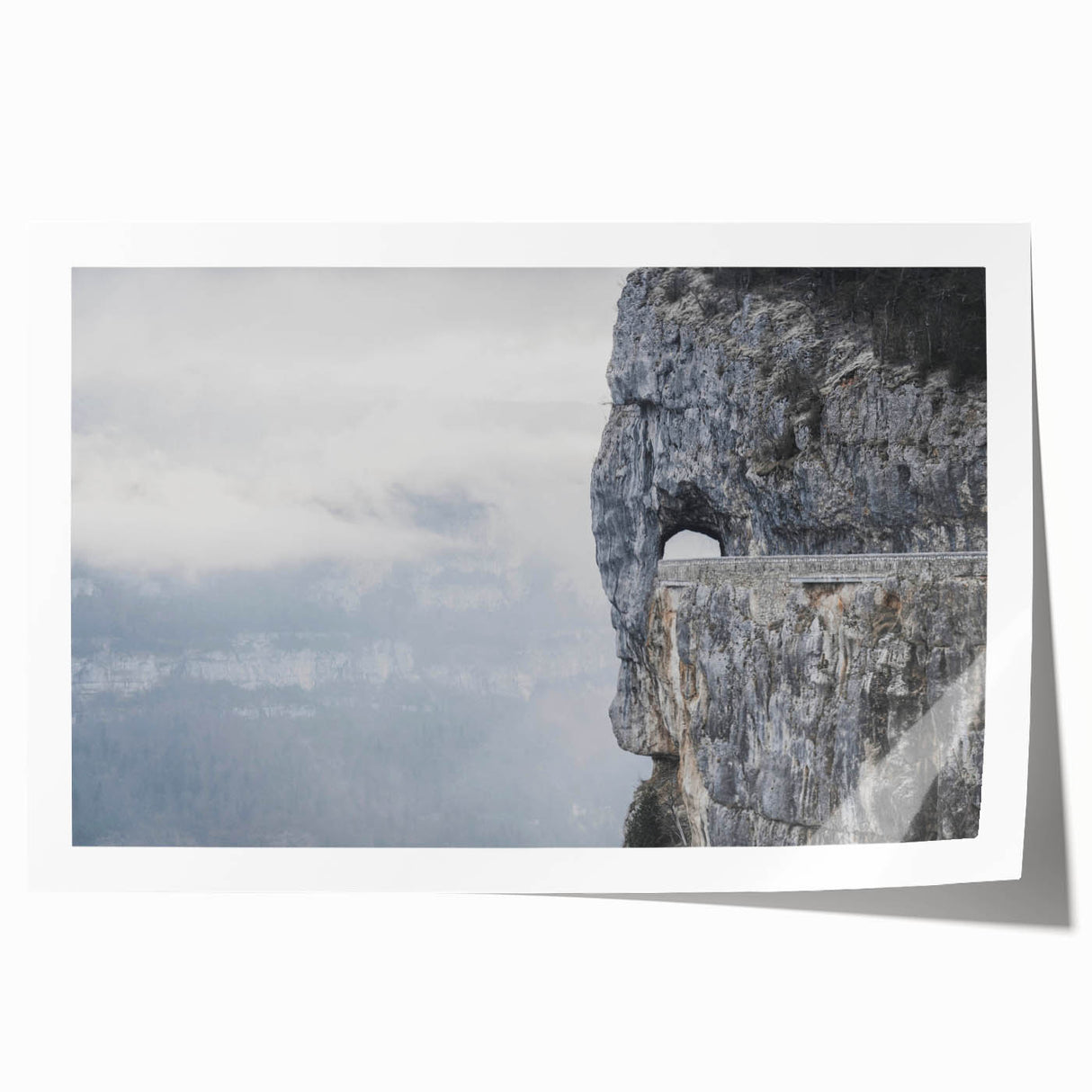 Abstract landscape wall art print showcasing vibrant colors and intricate rock formations, rolled and packaged securely in a cardboard tube for easy storage and display.