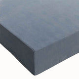 Close-up of a stretched canvas wall art piece showcasing a vibrant, abstract landscape design with bold colors and intricate rocky textures, perfect for modern decor.