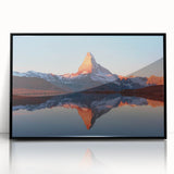 Framed acrylic wall art featuring a stunning landscape with rocks, presented in a sleek black frame. Ideal for enhancing modern home decor with natural beauty.