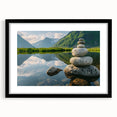 Black-framed wall art featuring a serene landscape with rocky formations and soft colors, perfect for enhancing modern home decor with natural elegance.
