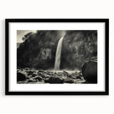 Framed wall art featuring a stunning landscape design with rocks and natural elements, set in a sleek black frame with a mat, ideal for modern home decor.
